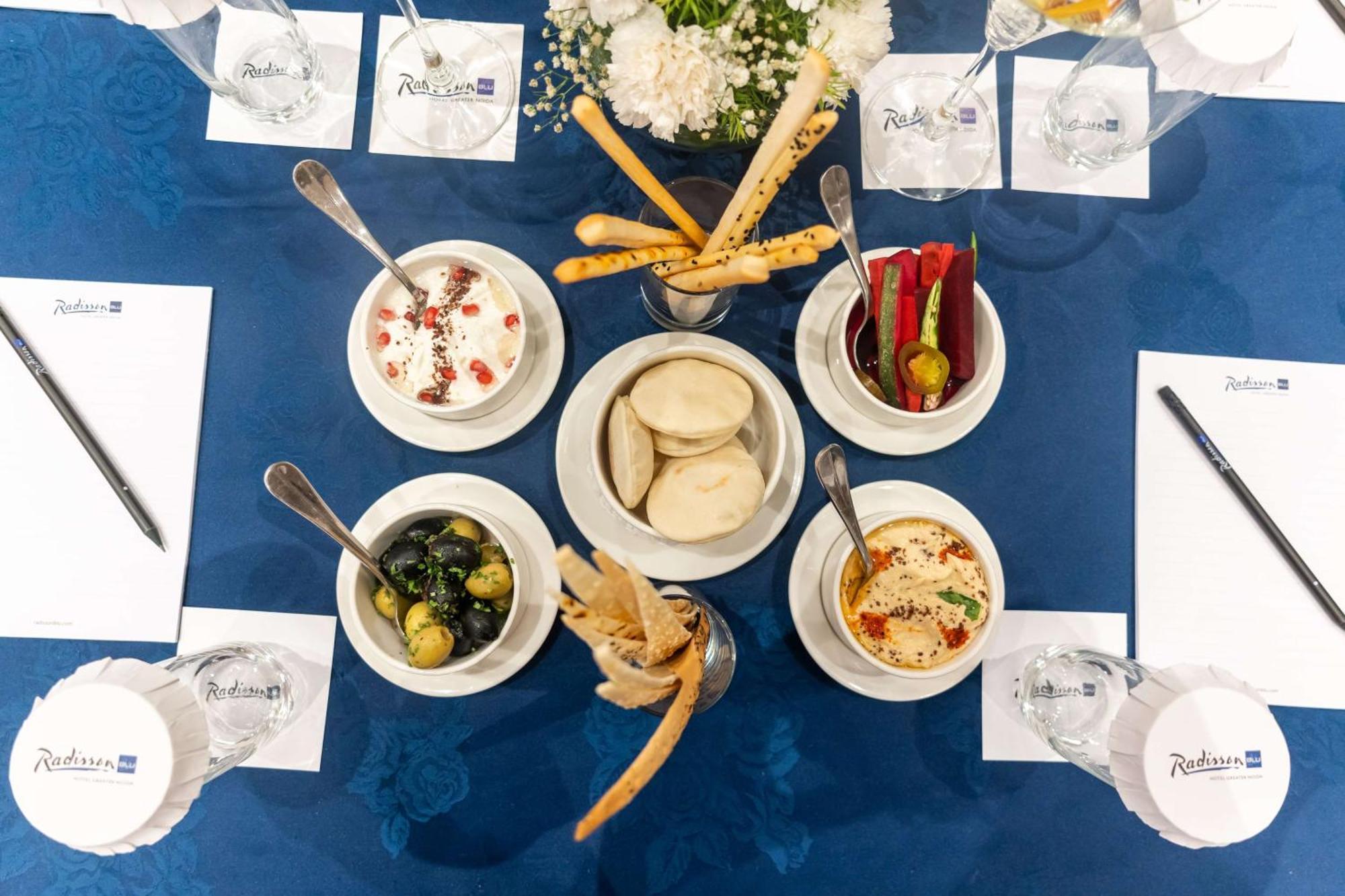 Radisson Blu Hotel, Greater Noida Kültér fotó A selection of Israeli snacks