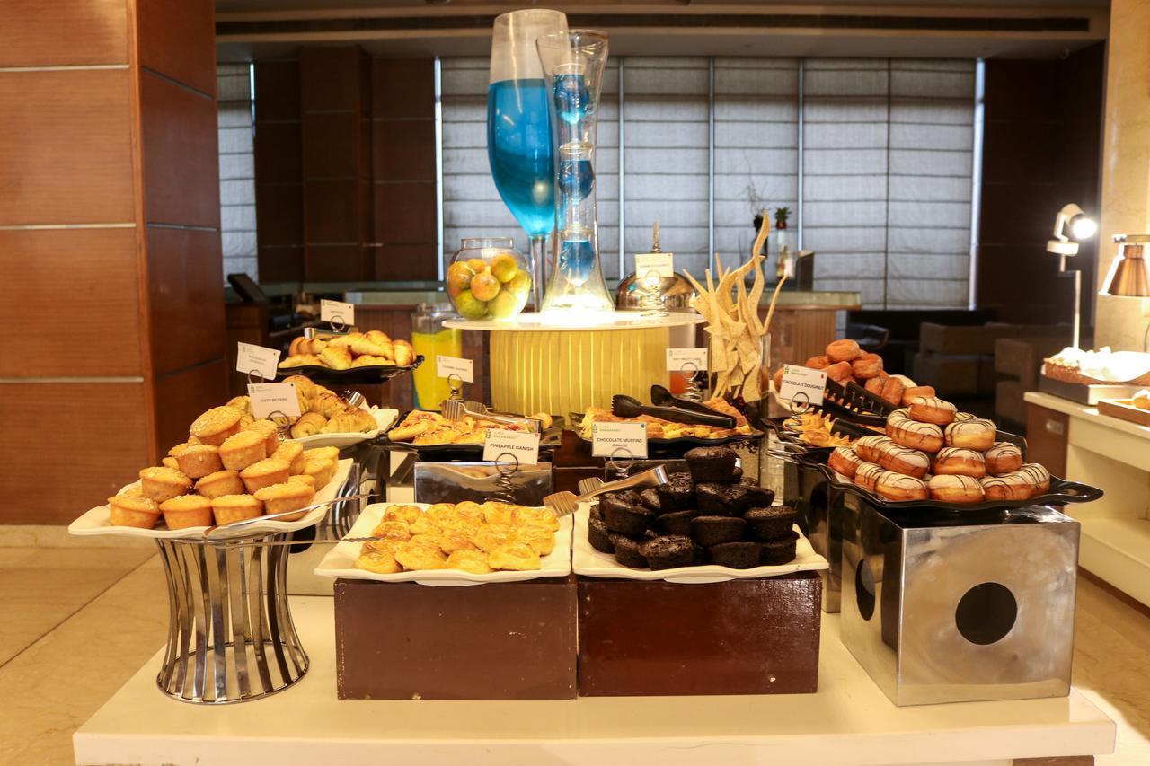 Radisson Blu Hotel, Greater Noida Kültér fotó A dessert buffet